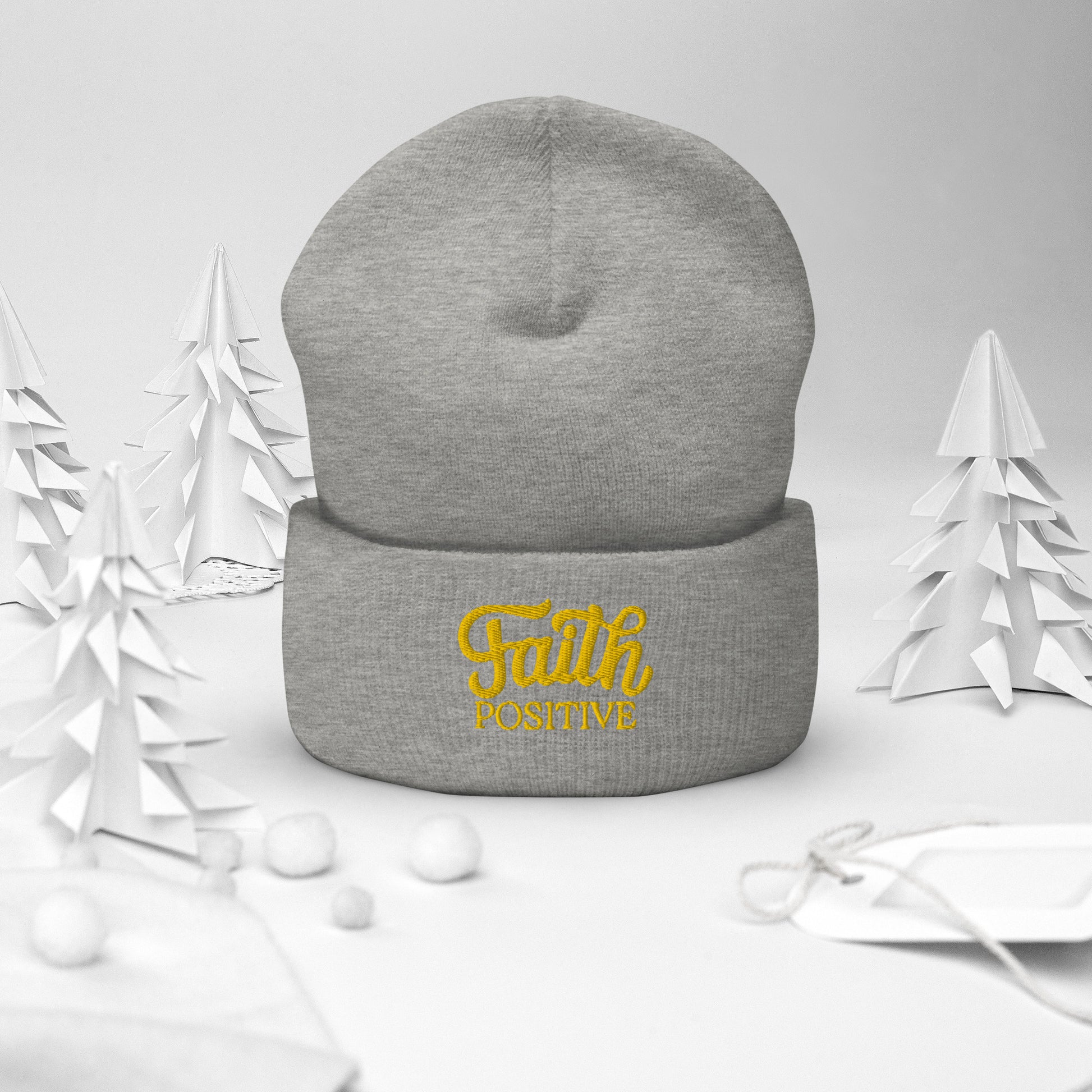 Faith Positive Cuffed Beanie. The Faith Positive logo is Embroidered with yellow thread on the cuff of the beanie. Hat is grey heather in color.