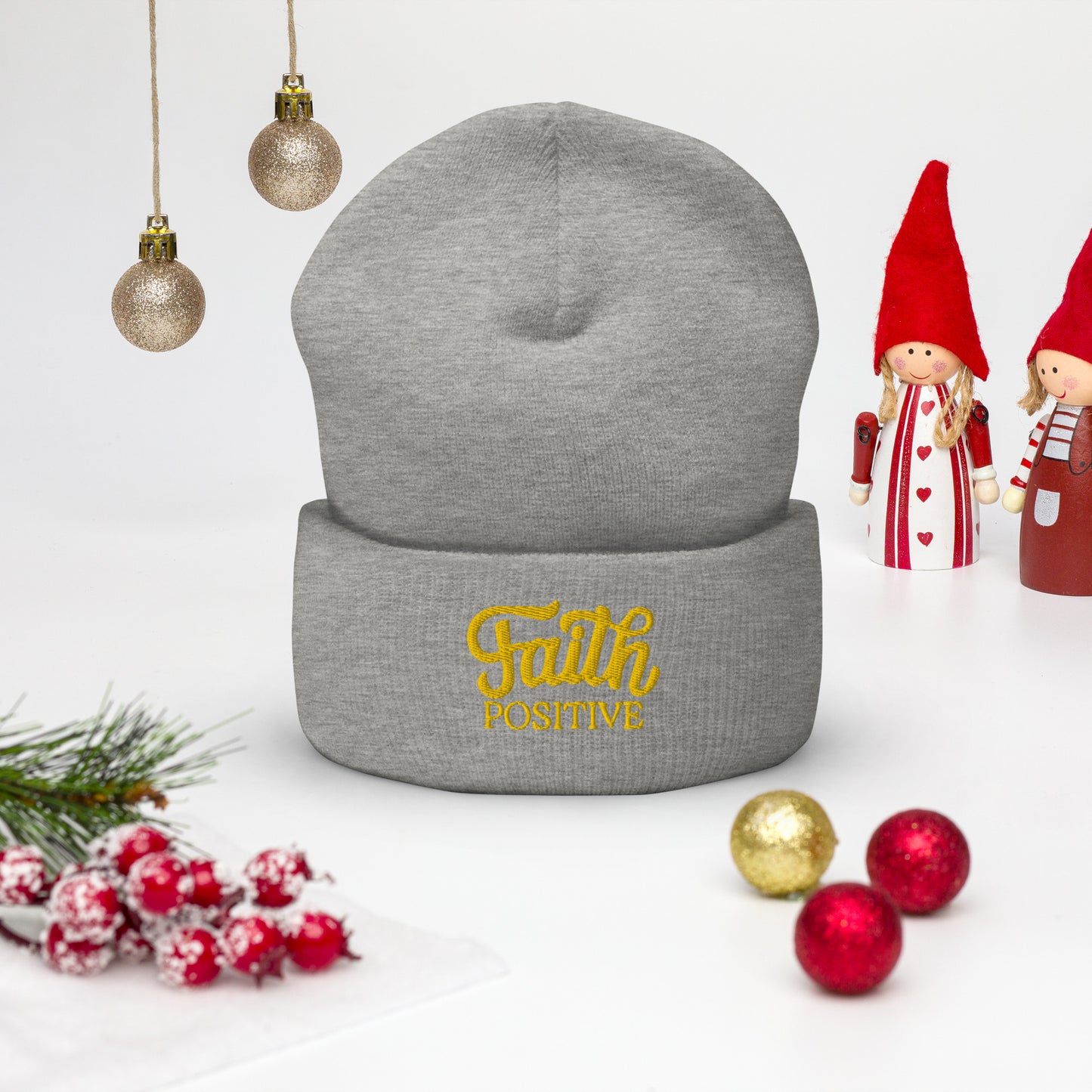 Faith Positive Cuffed Beanie. The Faith Positive logo is Embroidered with yellow thread on the cuff of the beanie. Hat is grey heather in color.