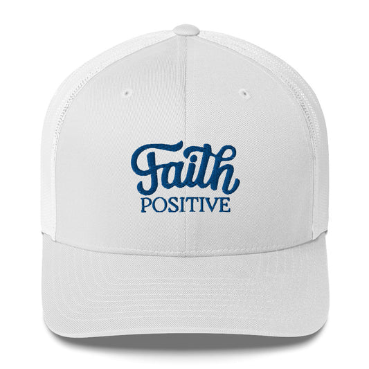 This is the Faith Positive Original trucker hat. The Faith Positive logo is embroidered on the front with blue thread. This hat is white in color. This is the side view of the product.