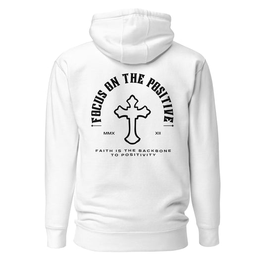 This is the Positive Arch Hoodie. Black ink illustrates the words "focus on the positive" as an arch with a cross in the middle. The roman numerals of 2022 are split up on either side of the cross and the quote "Faith is the backbone to positivity" is written underneath. The design is on the back. Hoodie is white in color. View shows the back of the product.